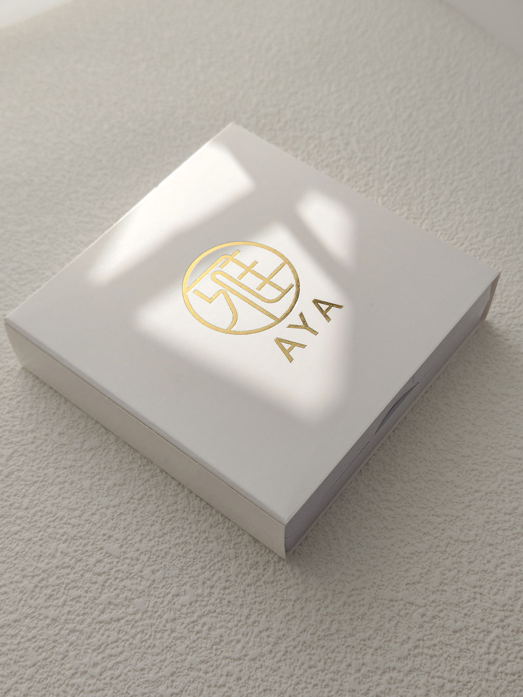Caja Aretes